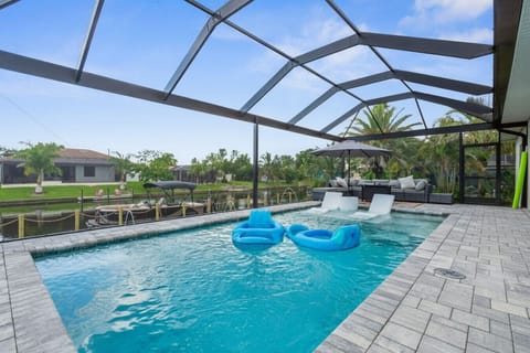 Private heated saltwater pool with Gulf-access canal views