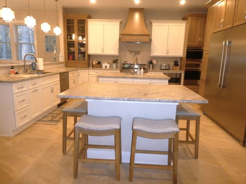 Kitchen with double full size frig and freezer, Bluestar 6 bvurner cooktop, 2 microwaves, 2 dishwashers and 2 ovens