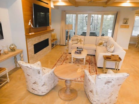 Great room opening to kitchen and dining area