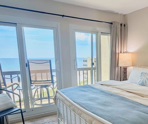 King-size bedroom opens to a balcony overlooking the Gulf.