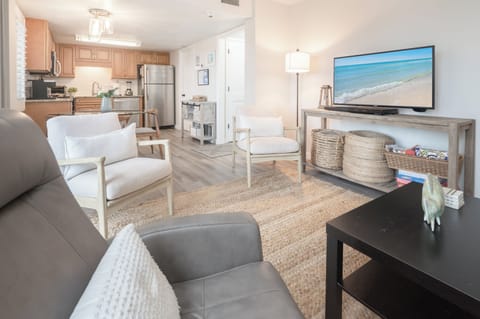 The open living/dining/kitchen space offers plenty of room to hang out.