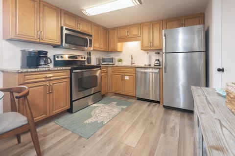 Our spacious kitchen is stocked with all the essentials.