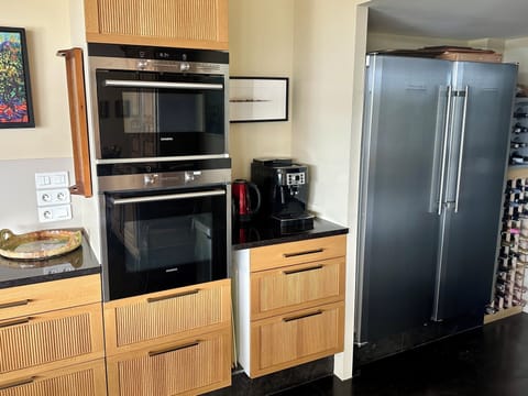 Main House Upper Level - Microwave, oven, espresso machine, double refrigerator.