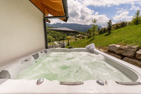 High-end outdoor hot tub for 5 people, perfect for relaxing in any season