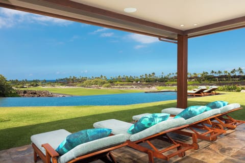 Lounge poolside and soak in panoramic fairway-to-ocean views.