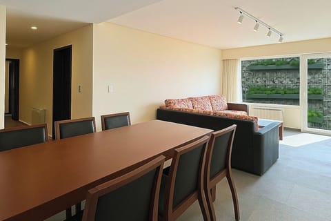 Gather for relaxed evenings in the bright living-dining space.