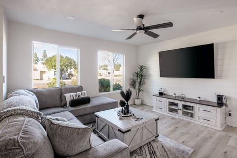 Cozy living space with brand new sofa and the black out curtains that pull either up or down and have been added just need to update the photos.