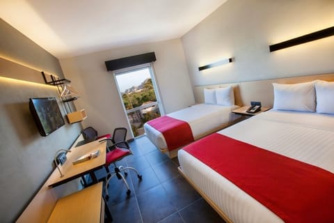 Unwind in a bright double room with scenic views.
