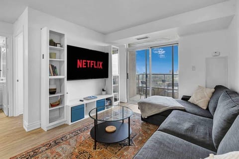 Relax in the inviting living room, enjoy Netflix & stunning balcony views.