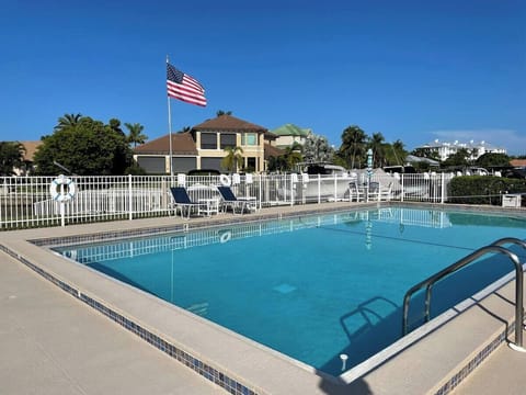 Heated pool overlooking channel to Gulf