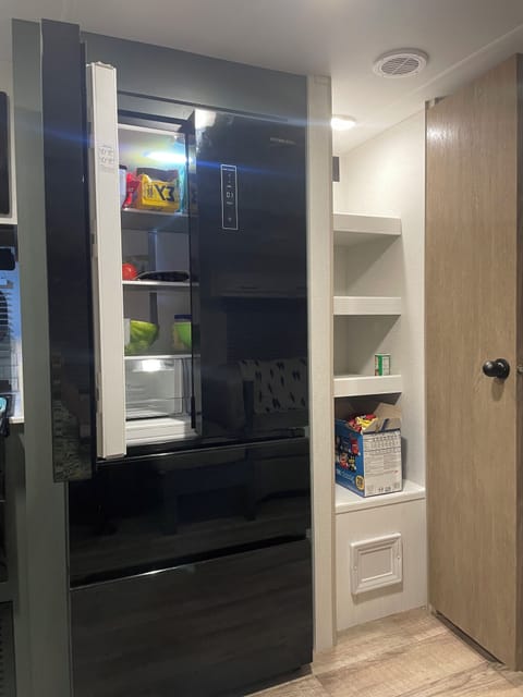 Full size frig and roomy pantry