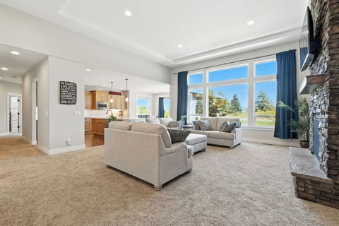 Great Room with a wall of windows. 