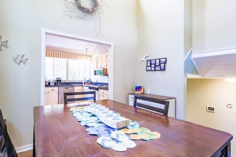 When you climb the half flight of stairs from the entryway, you will find the dining area and kitchen.