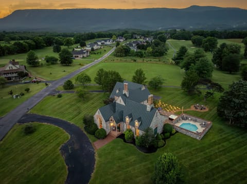 Welcome to your Shenandoah Valley escape – stunning views, private pool & hot tub, and timeless stone architecture