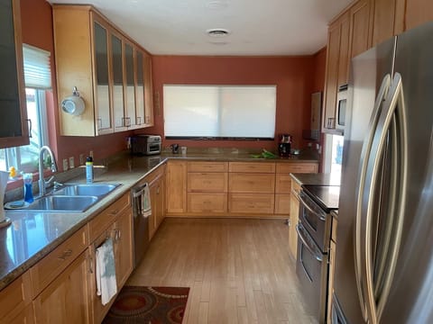 spacious updated kitchen with plenty of space and new refrigerator