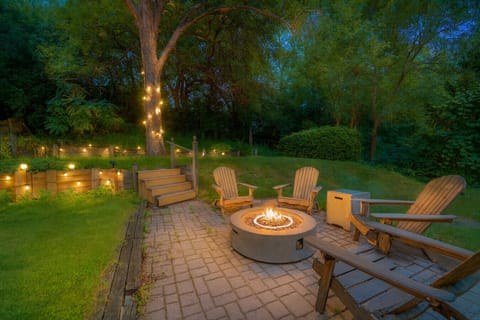 Fire pit & string lights – backyard oasis
