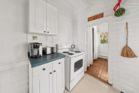 Keurig, dark coffee pods and sugar provided