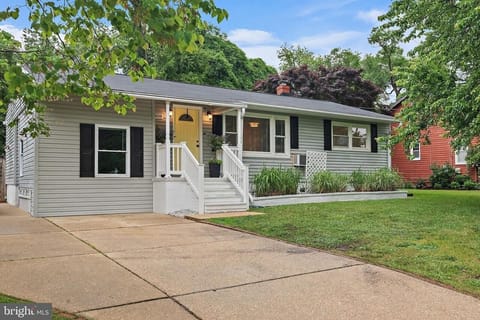 Front of home with space to park 4 cars.