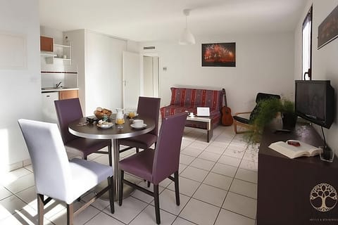 Settle in with breakfast at the table and relax on the sofa.