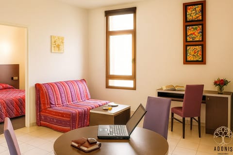 Work comfortably at the desk, then lounge steps from bed.