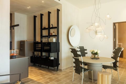 A dining table for four is also available