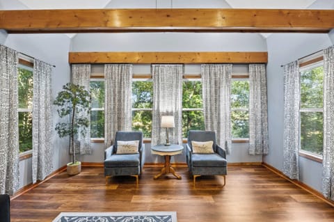 Living Room 2: Welcome home! Our beautifully designed living room blends rustic charm with modern comfort. It's an ideal gathering spot for making memories, playing games, or simply enjoying a quiet evening in.