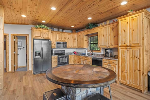 Kitchen Cabinets filled with Cookware and Dinnerware