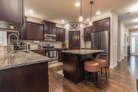 Cook up your favorite meals in this spacious, modern kitchen, complete with everything you need to dine in comfort during your stay.