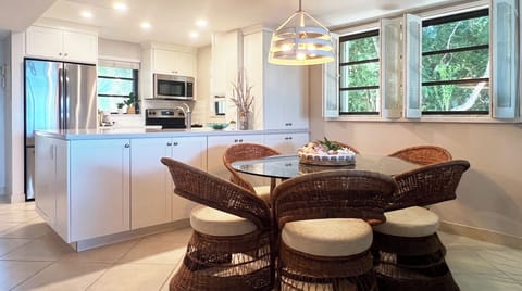 Dining Table with Kitchen in Background