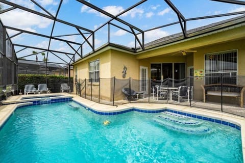 PATIO:  Outdoor Furniture with 4-Seat Dining Table, 2 Additional Chairs, 2 Ottomans and Outdoor Ceiling Fan