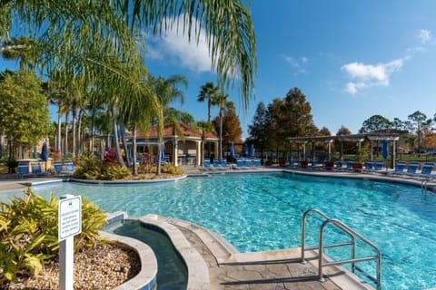 Large, family-friendly pool area with a shallow entry and plenty of space to relax and play.