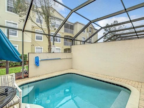 Relax in your private screened pool, ideal for sunny days.