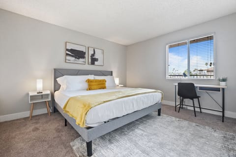 🛏️ Peaceful bedroom with a plush king bed and soft linens.