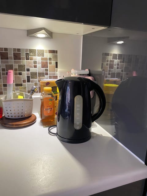 Access to open plan dining area, with dining essentials, kettle, free tea/coffee