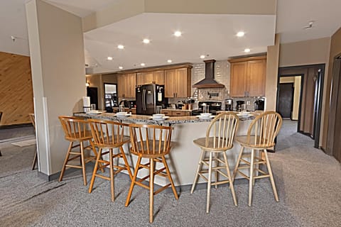 The kitchen island offers plenty of seating for your entire group and is the perfect spot to grab a bite before hitting the slopes!