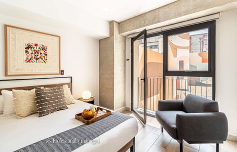 The building contains several similar units, Furniture, decor, and amenities may vary.