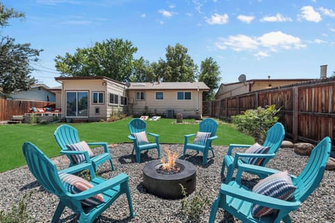 Outdoor fire pit area with Adirondack chairs—perfect for evening gatherings under the Colorado sky.