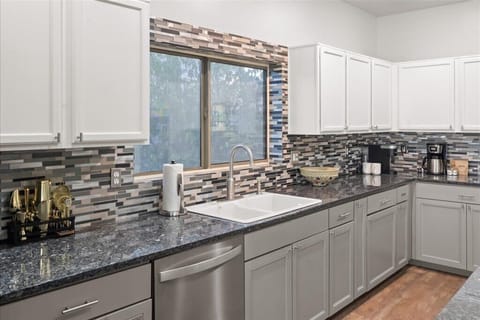 Kitchen goals achieved! Whip up your favorite meals in our stylish and fully equipped kitchen. Coffee's on us (you make it!). 