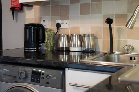 Modern kitchen essentials for your morning brew or quick meal.