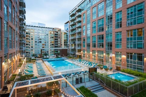 Unwind poolside with shaded loungers and breezy open walkways.