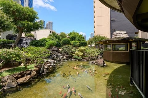 Arrive to a serene koi pond and iconic architecture.