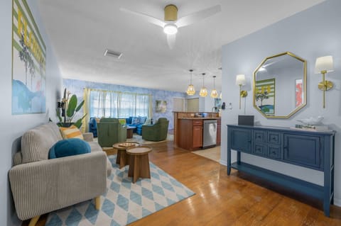 Warning: May cause spontaneous group photos and extreme relaxation. This chic and comfy living area is the perfect spot to kick back and unwind.