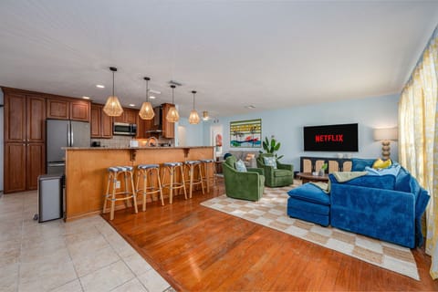 Where the cooking happens and the couch calls your name. Our open and airy living space is perfect for gathering, whether it's around the breakfast bar or in front of the Netflix screen!