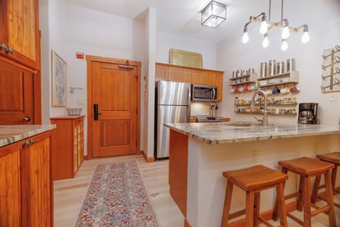 Quaint kitchen with all of the essentials