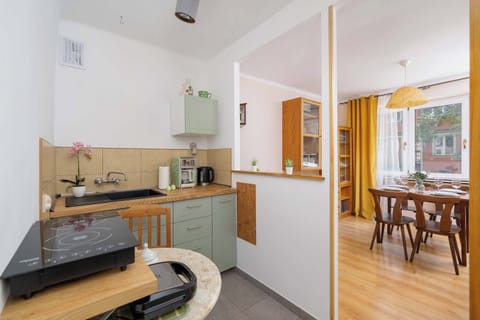 The kitchen area's practical layout maximizes functionality.