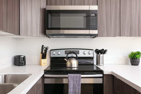 "Prepare meals with ease in our fully-equipped kitchen."