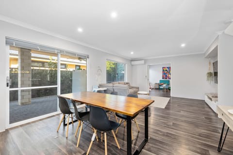 Gather together and create lasting memories around our dining table, perfectly situated in the heart of our open-concept living space.