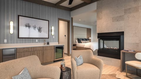 Bedroom 1, Upper Level - Riverlight Lodge primary king suite with bar and additional seating area.