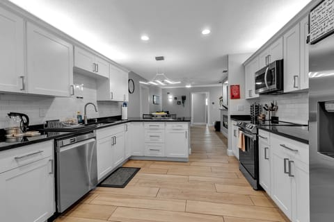 Shared Kitchen With Updated Stainless Steel Appliances