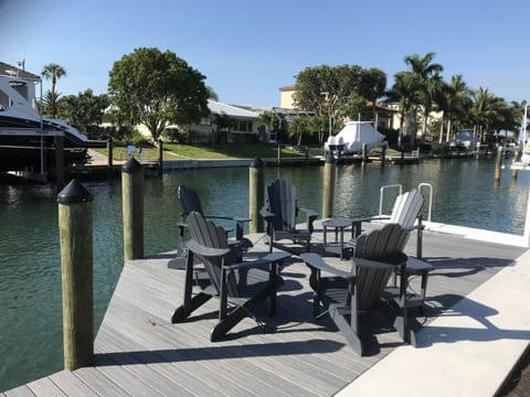 Spacious dock with seating and bay view.